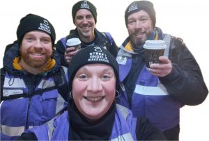 Four street angels enjoying a coffee before the shift